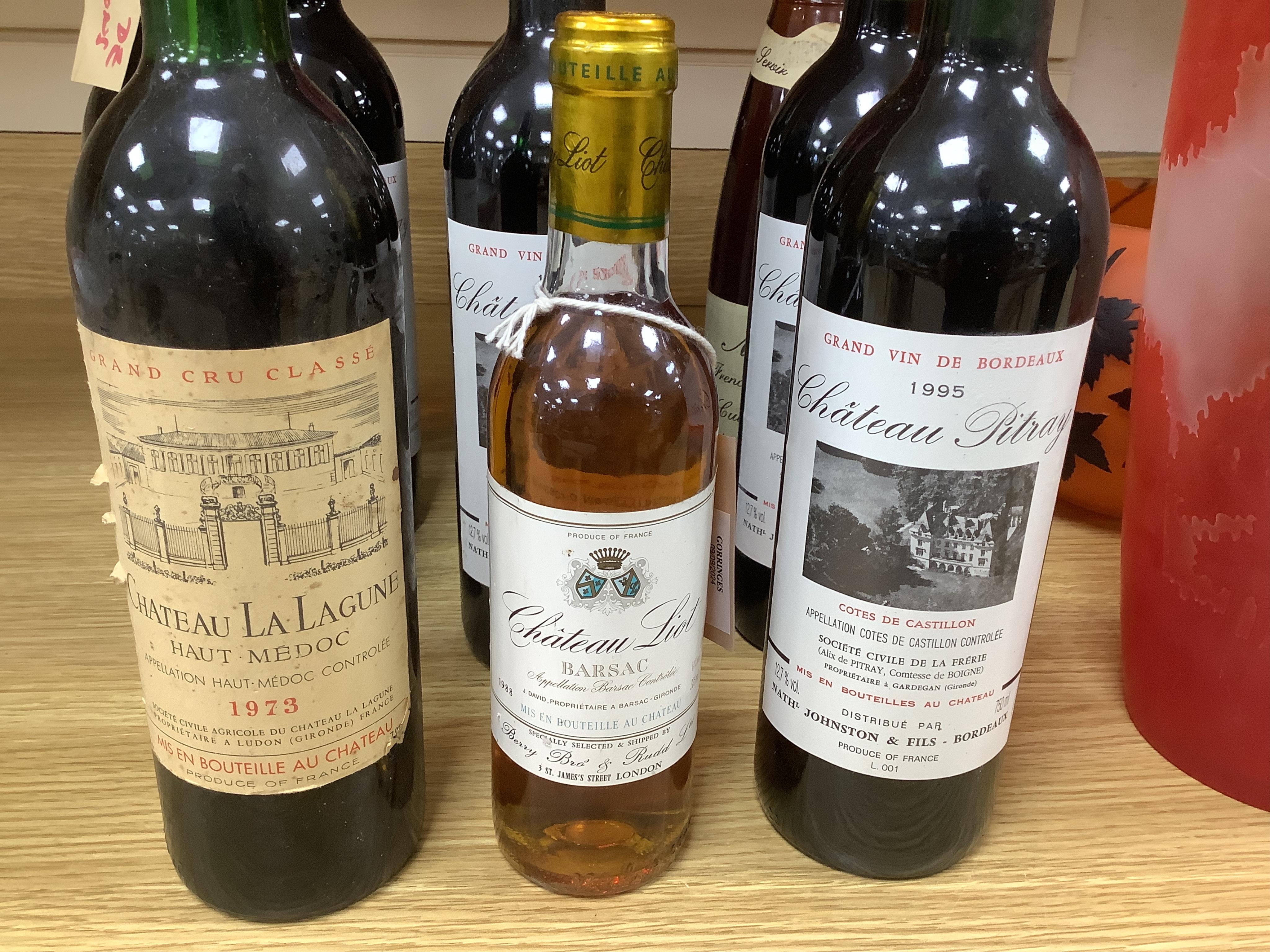 Eleven bottles of wine to include six bottles of Chateau Pitray 1995, a bottle of Chateau La Lagune Haut Medoc 1973, a bottle of Chateau La Tour De Mons Grand Vin Margaux 1982, a bottle of Chateau Loupiac Gaudiet Loupiac